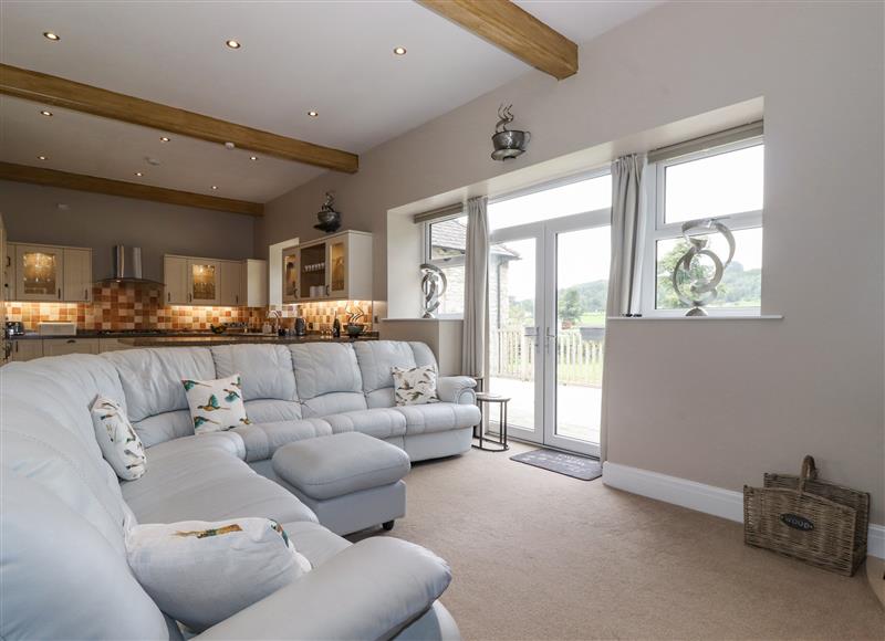 Relax in the living area at The Gatehouse, Levens