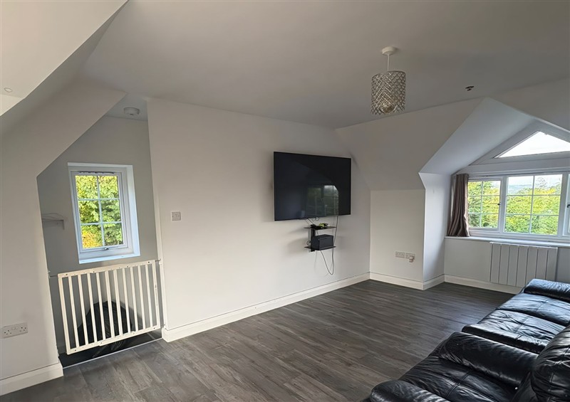 This is the living room at The Gatekeepers Cottage - Skerry Vore, Bryn Pydew near Llandudno Junction
