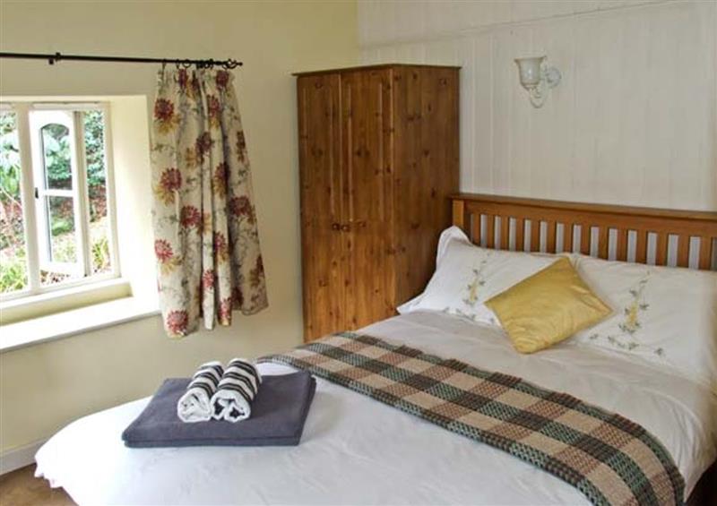 A bedroom in The Generals Cottage at The Generals Cottage, Wye Valley