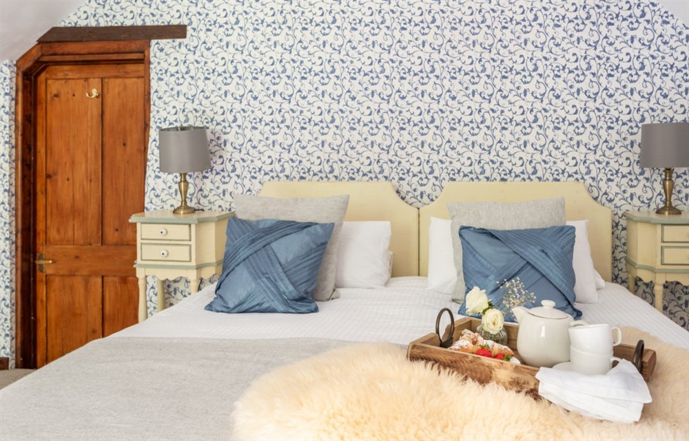 This is a bedroom (photo 5) at The Georgian House in Combe Martin