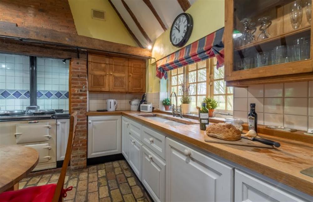 Kitchen with Aga and dishwasher at The Gildhall, Higham