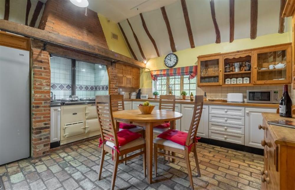 Kitchen with Aga and large American style fridge freezer at The Gildhall, Higham
