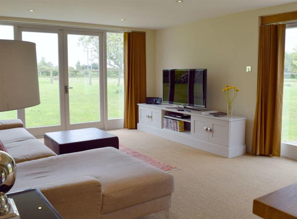 Light and airy comfortable living area at The Glass Room in Ardleigh Heath, near Colchester, Essex