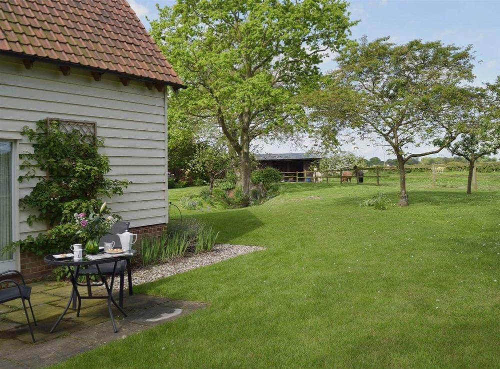 Lovely extensive lawned garden and grounds at The Glass Room in Ardleigh Heath, near Colchester, Essex