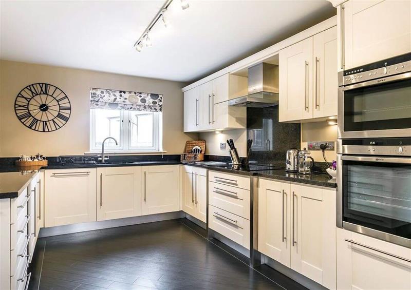 This is the kitchen at The Golf Apartment, Kendal