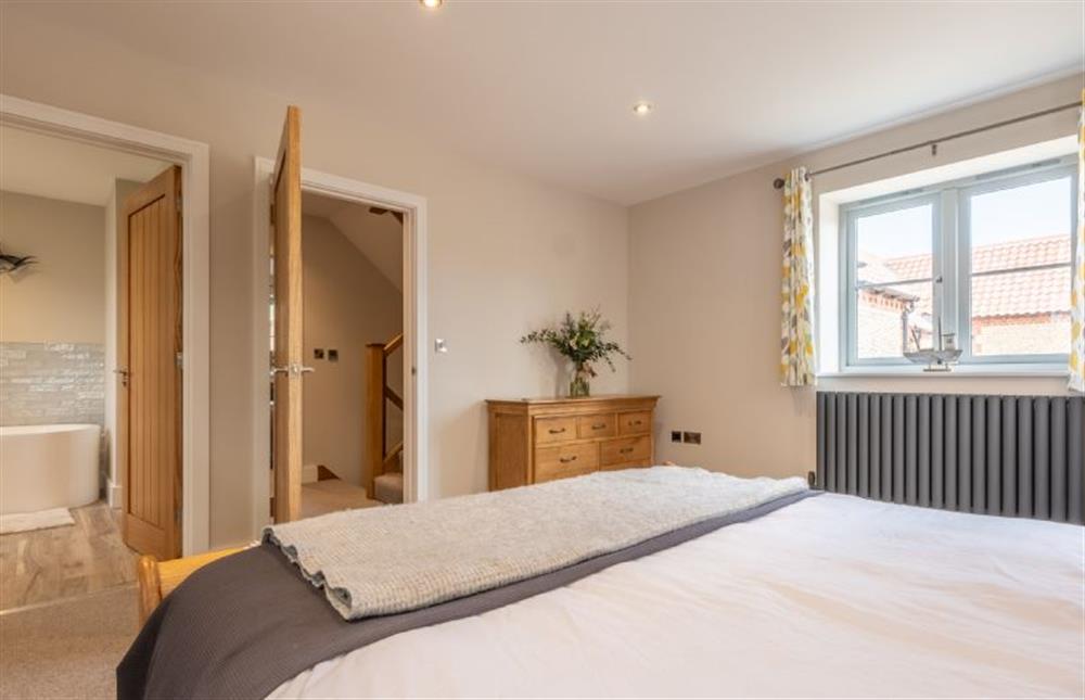 Master bedroom with en-suite at The Goosebec, Burnham Market near Kings Lynn