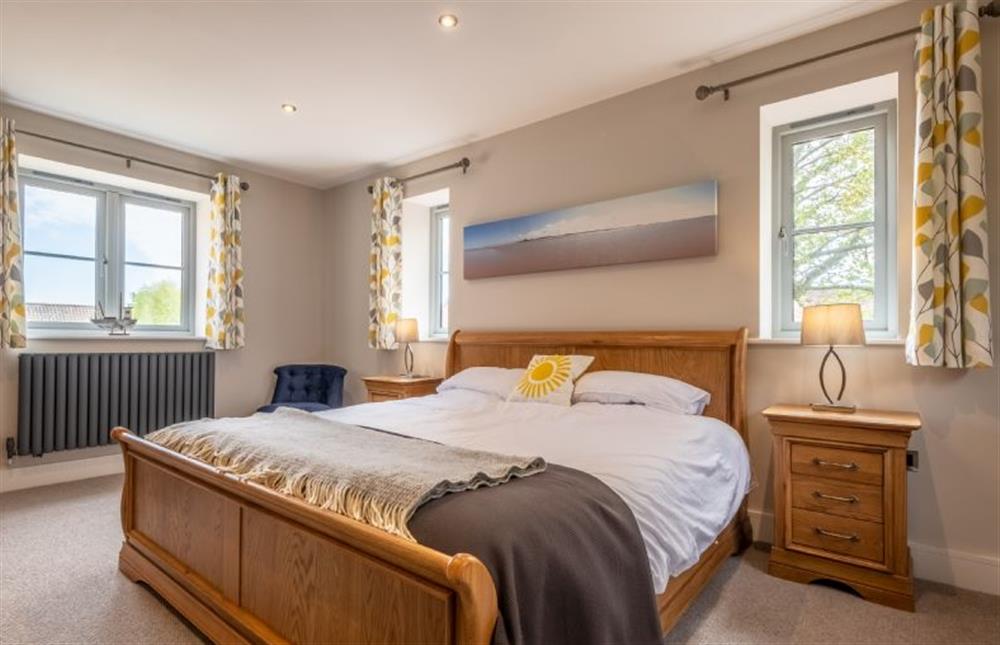 Master bedroom with super-king bed at The Goosebec, Burnham Market near Kings Lynn