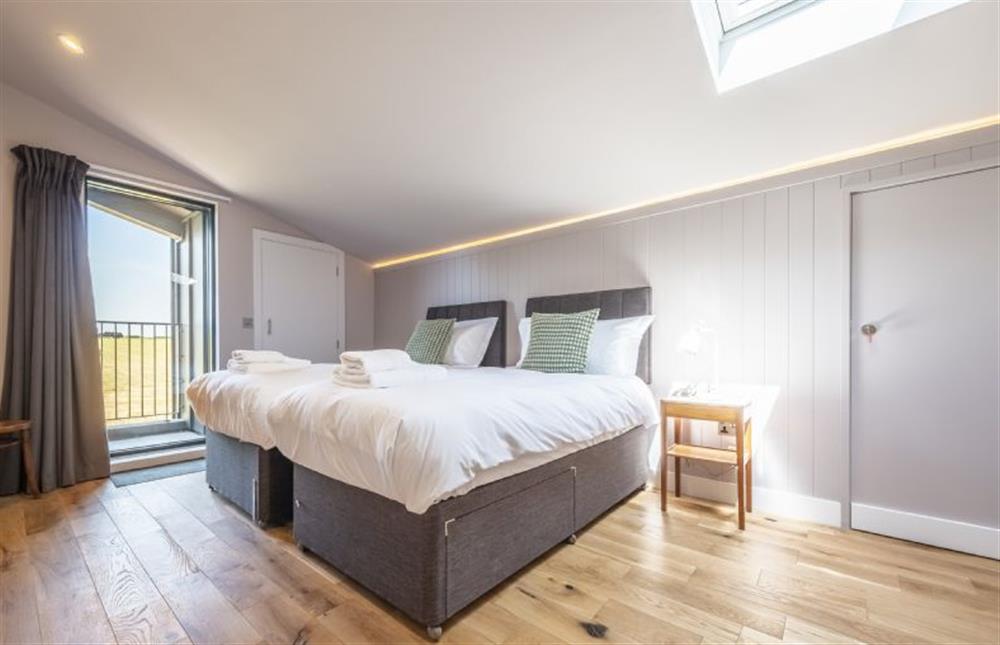 Bedroom three with 6’ super-king size zip and link bed at The Grain Store, Reepham