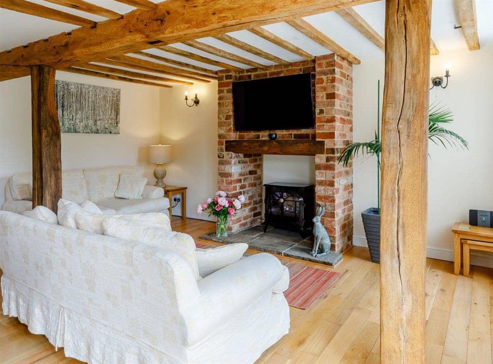 Spacious lounge with exposed beams at The Granary in Aisby, Grantham, Lincolnshire