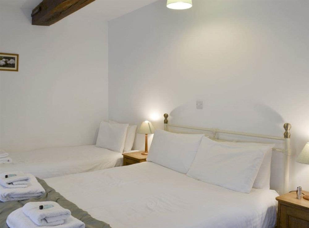 Useful family bedroom with a double and a single bed at The Granary Barn in North Willingham, near Market Rasen, Lincolnshire