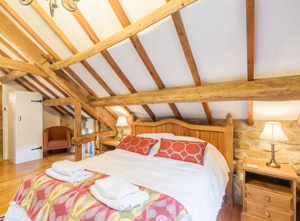 Double bedroom with beamed ceiling (photo 2) at The Granary in Bilsdale, near Helmsley, North Yorkshire