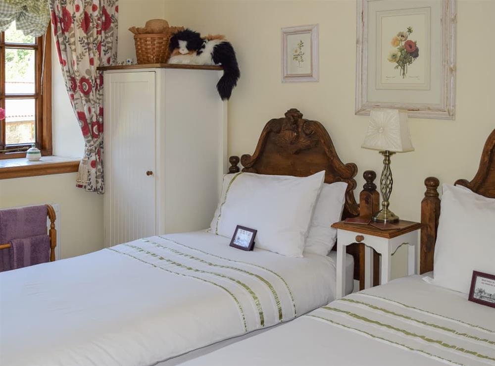 Twin bedroom at The Granary in Brightstone, Isle of Wight