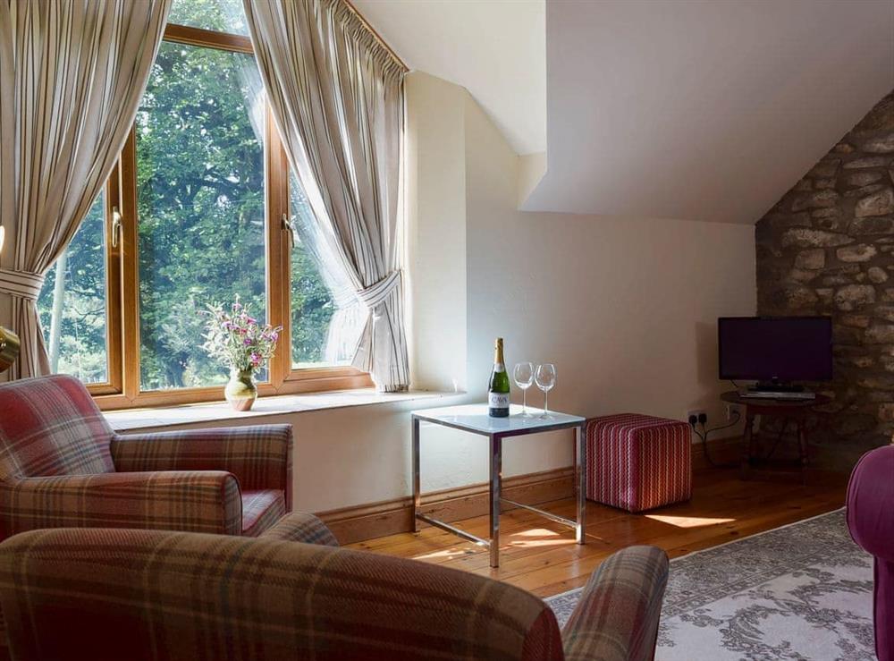 Cosy living and dining room at The Granary in Clarbeston Road, Dyfed