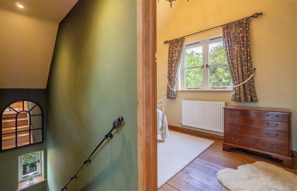 Stairs to the ground floor with views of the second bedroom at The Granary, Dunstall Green, Dunstall Green