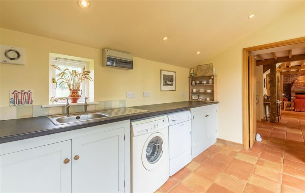 Large utility room with washing machine and tumble dryer at The Granary, Hacheston