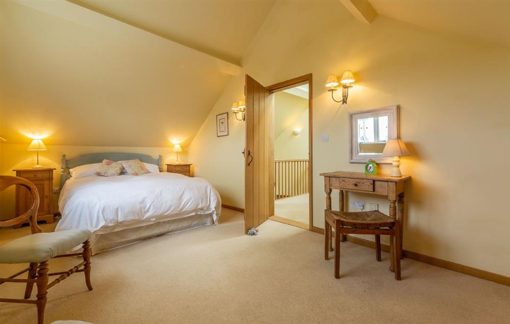 Master bedroom with king size bed and fabulous countryside views at The Granary, Hacheston