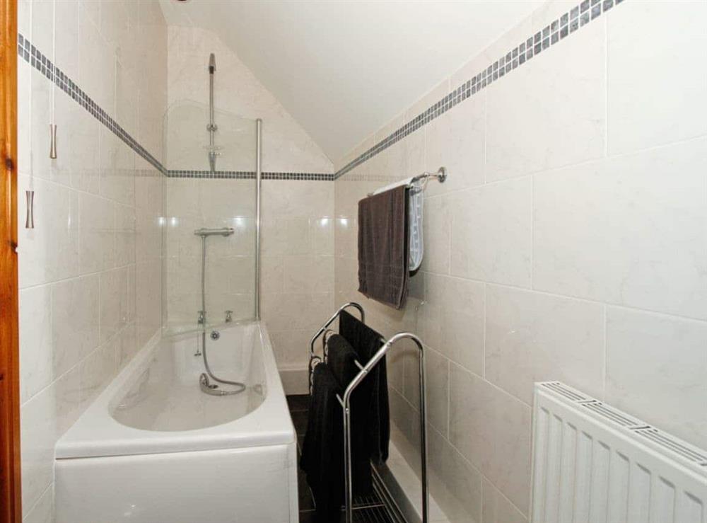 Bathroom with shower over bath at The Granary in North Somercotes, near Louth, Lincolnshire