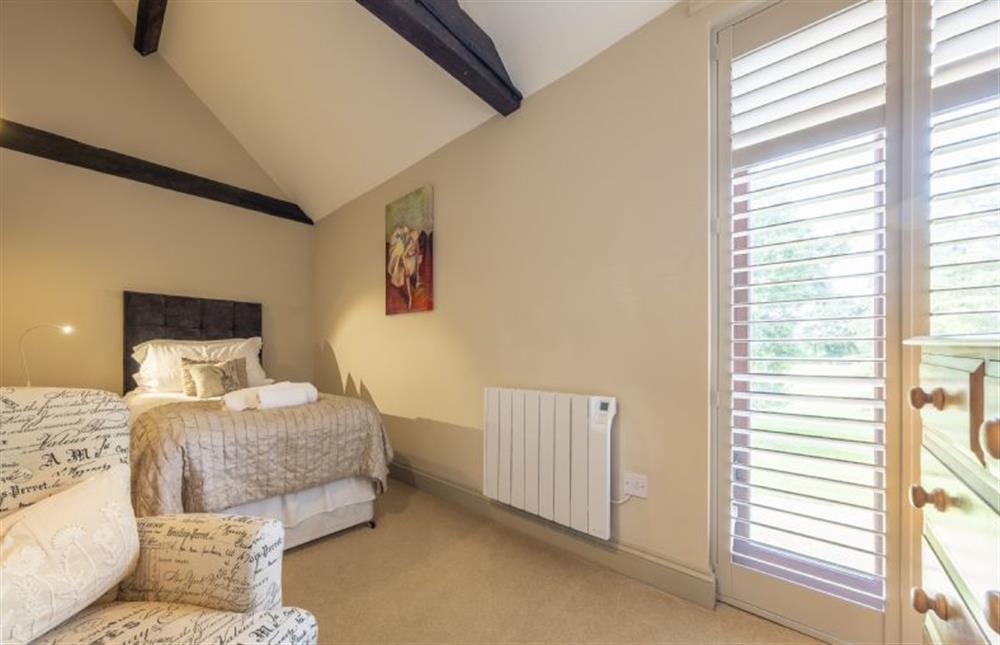 Bedroom three with adult single bed at The Granary, Oulton near Norwich