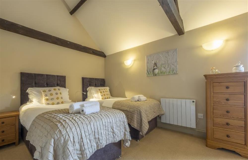 Bedroom two with adult twin beds at The Granary, Oulton near Norwich