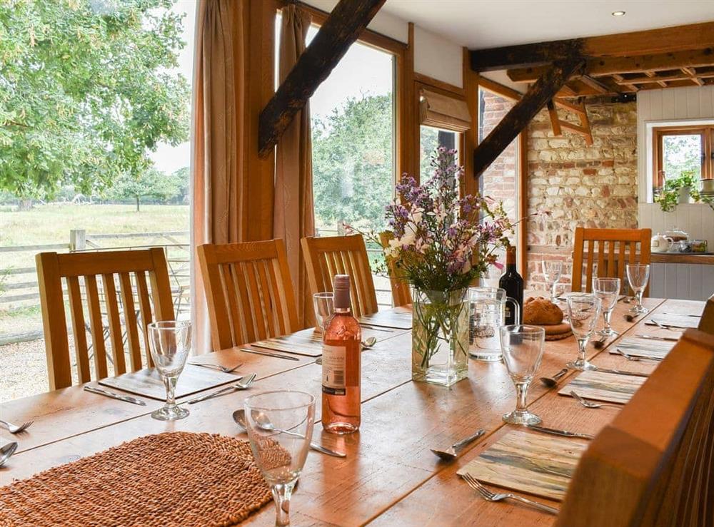 Beamed dining room with wonderful views at The Granary in Oxborough, Norfolk., Great Britain