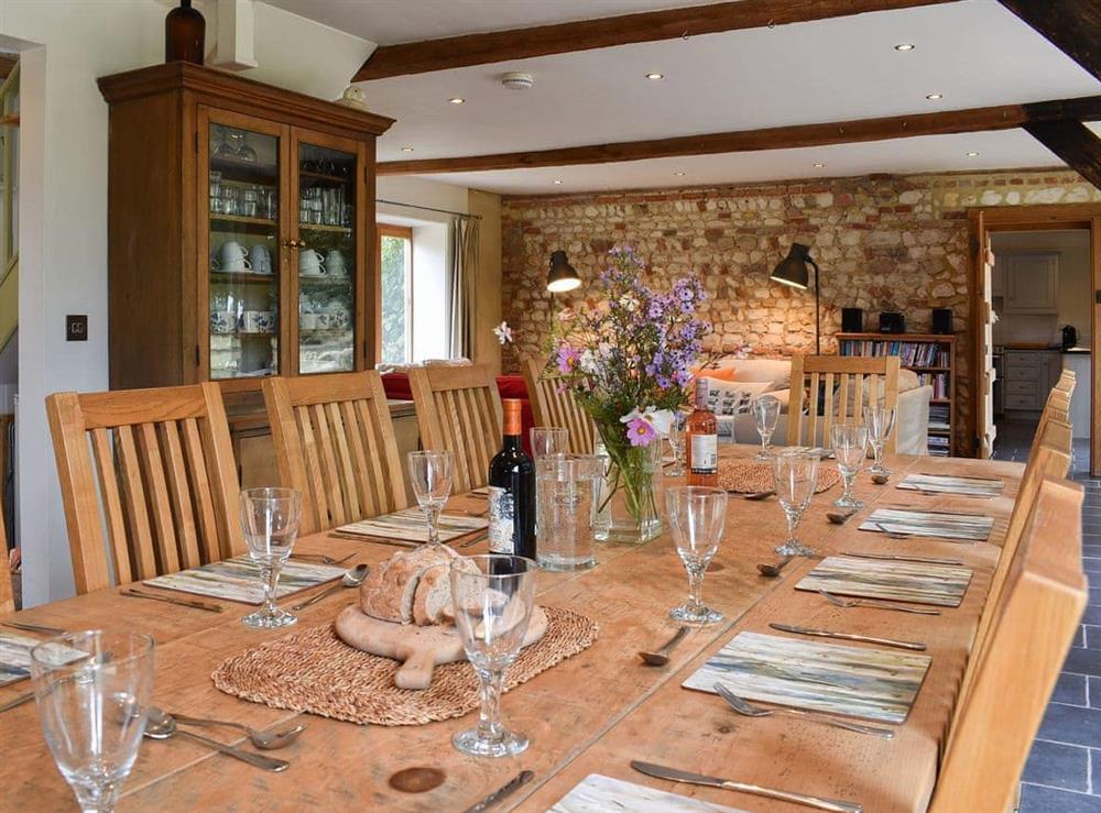 Large elegant dining table and chairs at The Granary in Oxborough, Norfolk., Great Britain