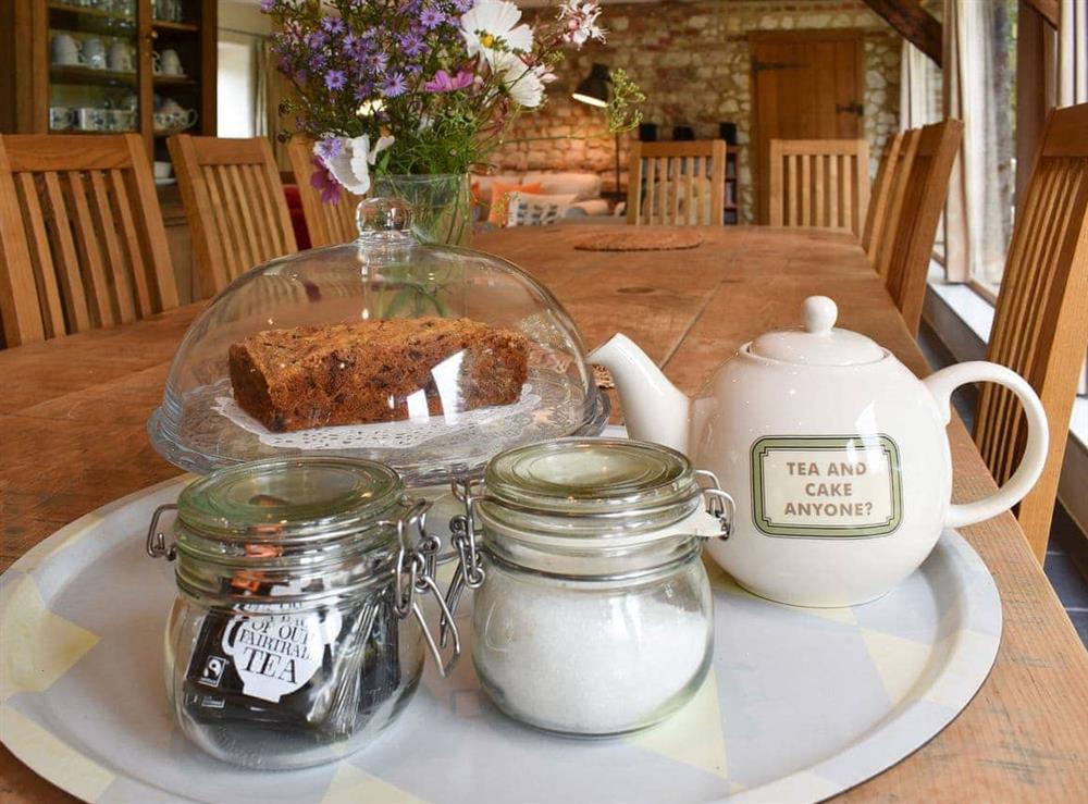 Typical welcome pack including a cake and a pot of tea at The Granary in Oxborough, Norfolk., Great Britain