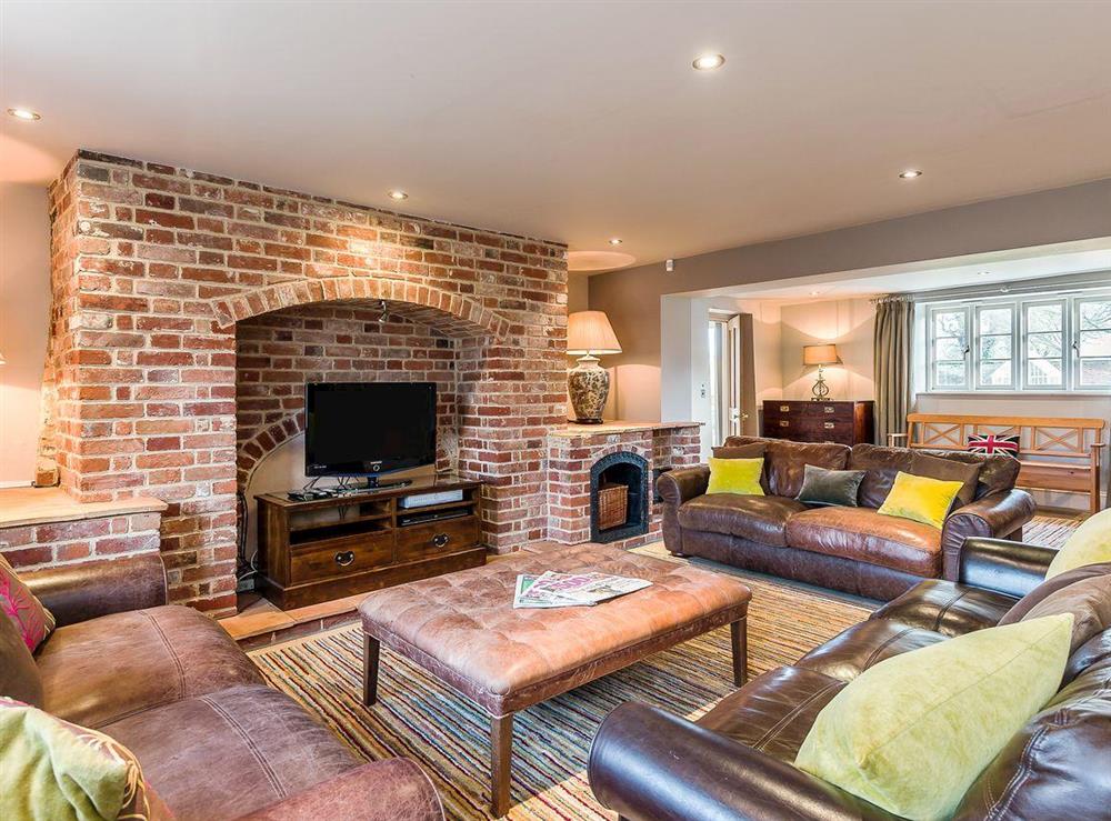 Cosy living room at The Grange Farmhouse in Sculthorpe, Norfolk