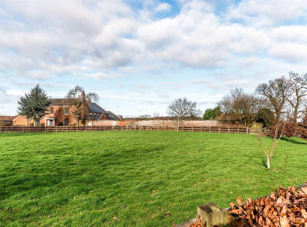 Detached property surrounded by its own natural meadows at The Grange Farmhouse in Sculthorpe, Norfolk