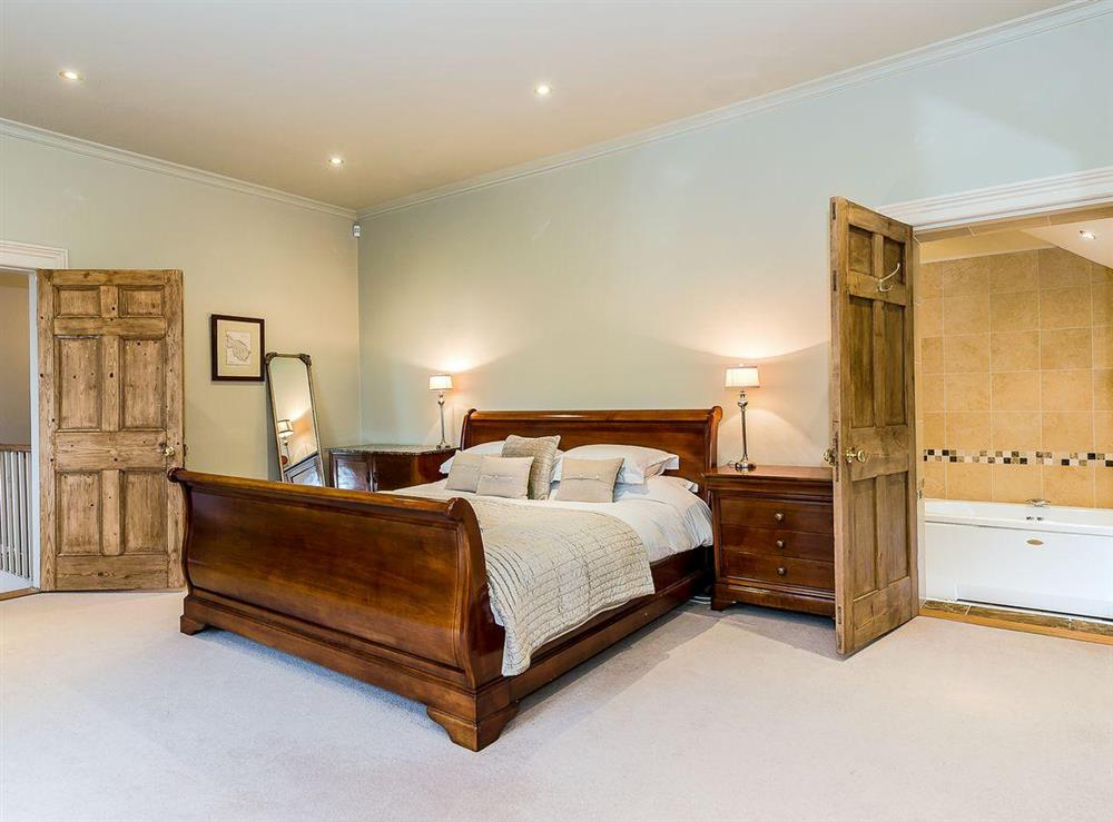 Double bedroom with 6ft bed at The Grange Farmhouse in Sculthorpe, Norfolk