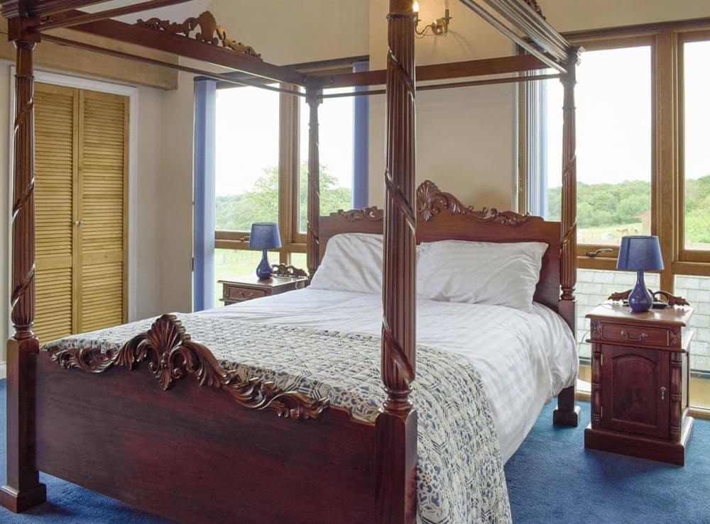 Attractive en-suite four poster bedroom at The Grange in Hope-under-Dinmore, near Leominster, Herefordshire
