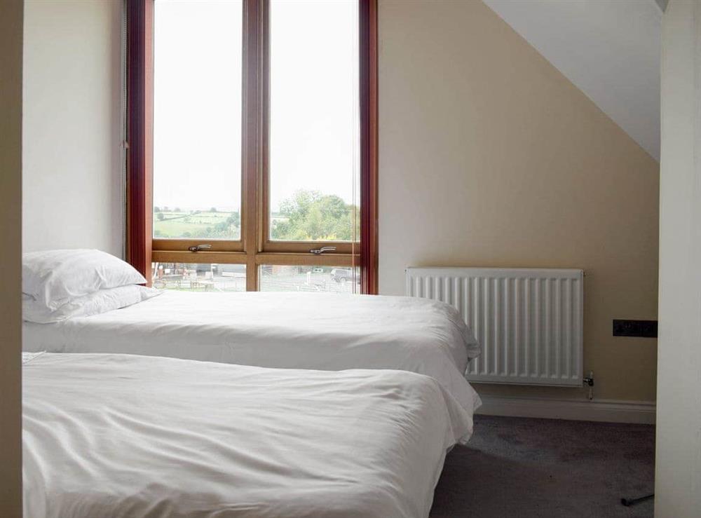 Comfortable twin bedroom at The Grange in Hope-under-Dinmore, near Leominster, Herefordshire