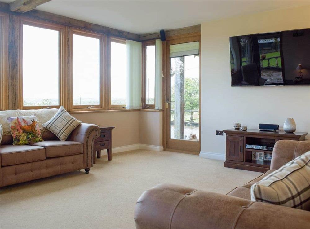 Welcoming living room at The Grange in Hope-under-Dinmore, near Leominster, Herefordshire
