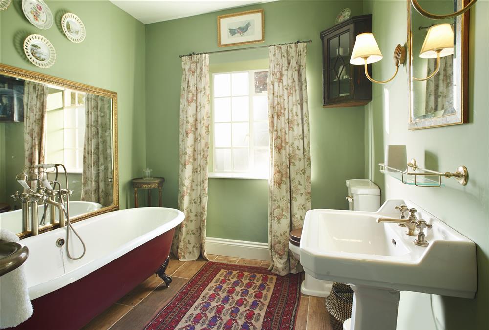 En-suite to bedroom two with a roll-top bath at The Green, Castle Howard, Coneysthorpe