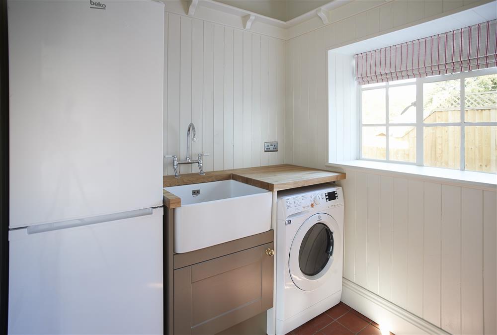 Utility room with combined washer/dryer