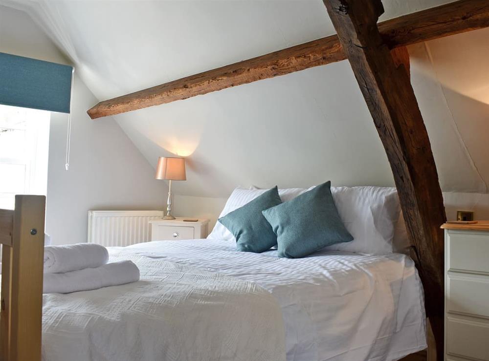 Charming bedroom with double bed and single bed at The Green in Richmond, North Yorkshire