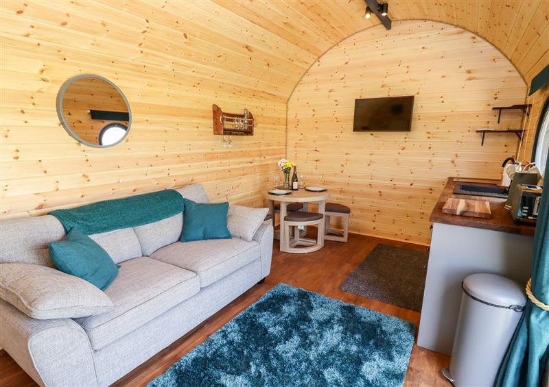 Relax in the living area at The Happy Valley Pod, Chipping Norton
