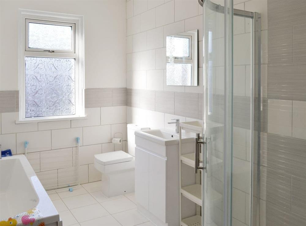 Bathroom with bath and separate shower cubicle at The Harbour Masters House in Bridlington, North Humberside
