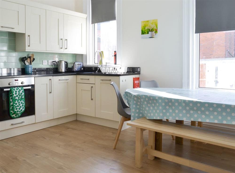 Light and airy dining area within kitchen at The Harbour Masters House in Bridlington, North Humberside