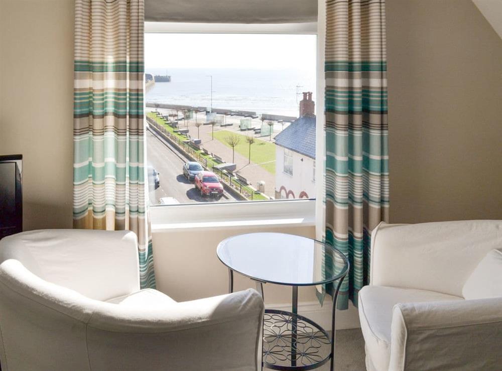 Seating area within double bedroom at The Harbour Masters House in Bridlington, North Humberside
