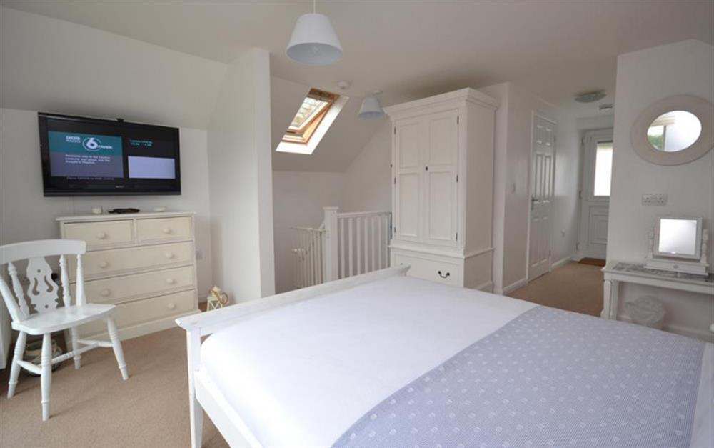 Master bedroom, showing access to the twin bedroom at The Haven in Noss Mayo