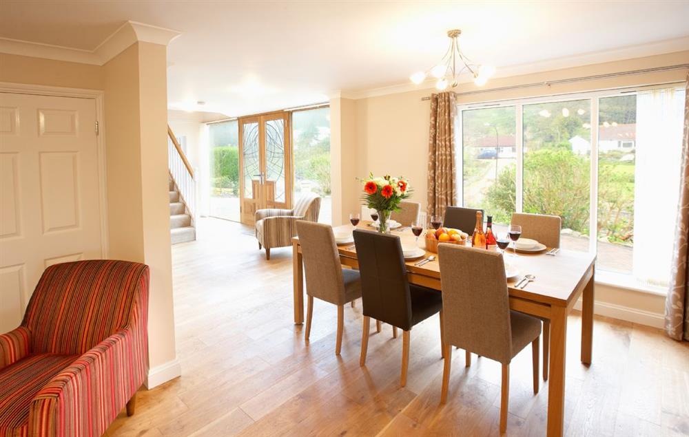 Open-plan kitchen/dining and snug area. The snug has double patio doors onto the rear sun terrace (photo 3) at The Haven, Ventnor