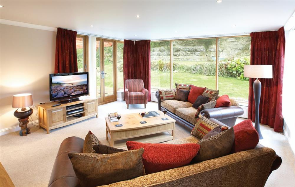 Sitting room with TV and Sky HD, this room also leads on to the rear sun terrace at The Haven, Ventnor