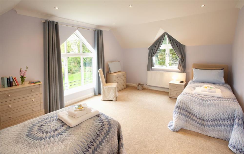 Twin bedroom with two 3’ beds (both with full height pull-out beds) at The Haven, Ventnor