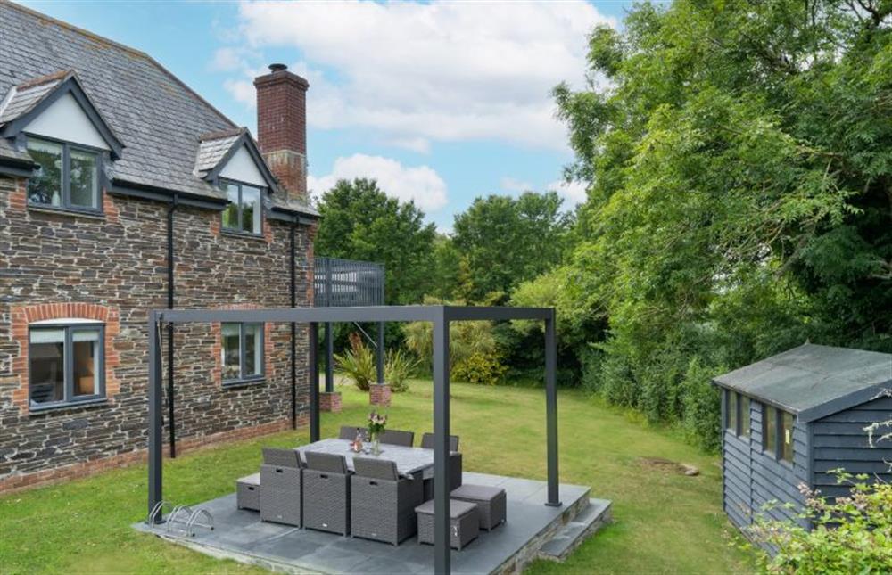Large garden with outdoor furniture, charcoal barbecue and pergola. at The Hawthorns, St Minver
