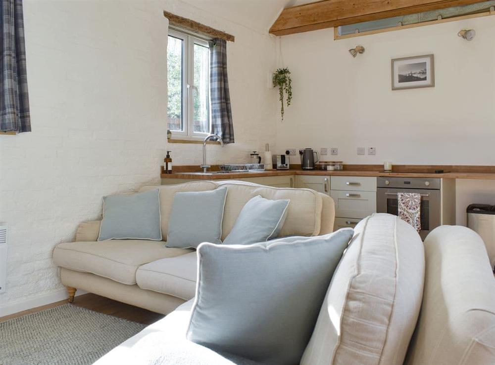 Comfortable seating within living area at The Hay Barn in Beccles, Suffolk
