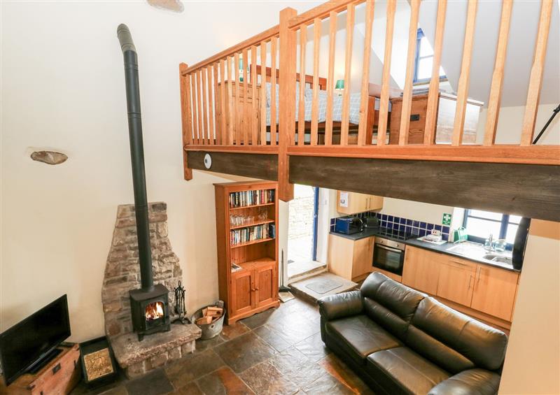 Relax in the living area at The Hay Barn, New Mills