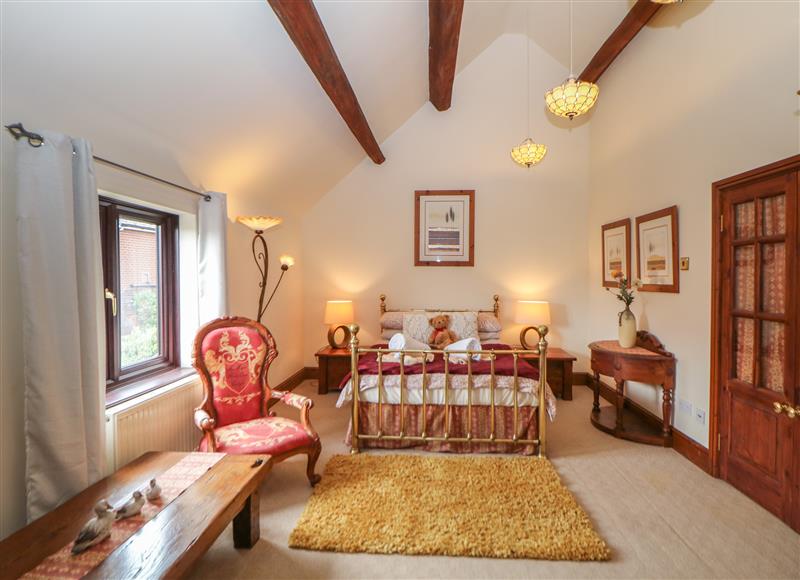 Relax in the living area at The Haybarn, Lichfield