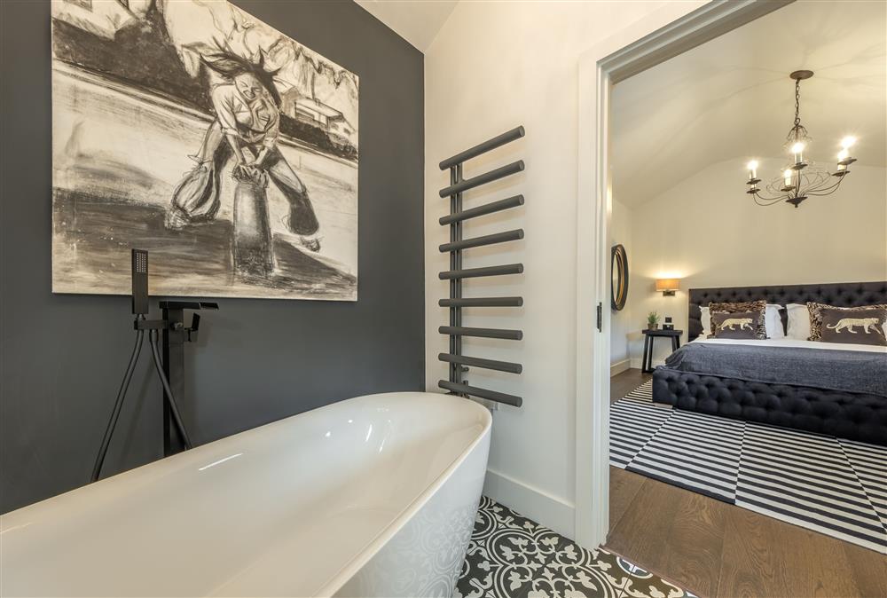 En-suite to bedroom one with free-standing bath at The Haybarn, Surrey Hills