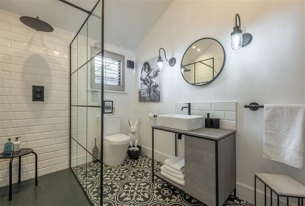 Large, walk-in shower in en-suite bathroom to bedroom one at The Haybarn, Surrey Hills