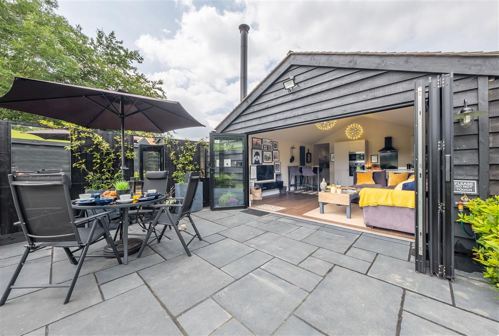 Open up the bi-fold doors and dine outside on those balmy summer evenings at The Haybarn, Surrey Hills